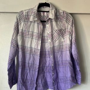 Two long sleeve printed bottom down shirts.